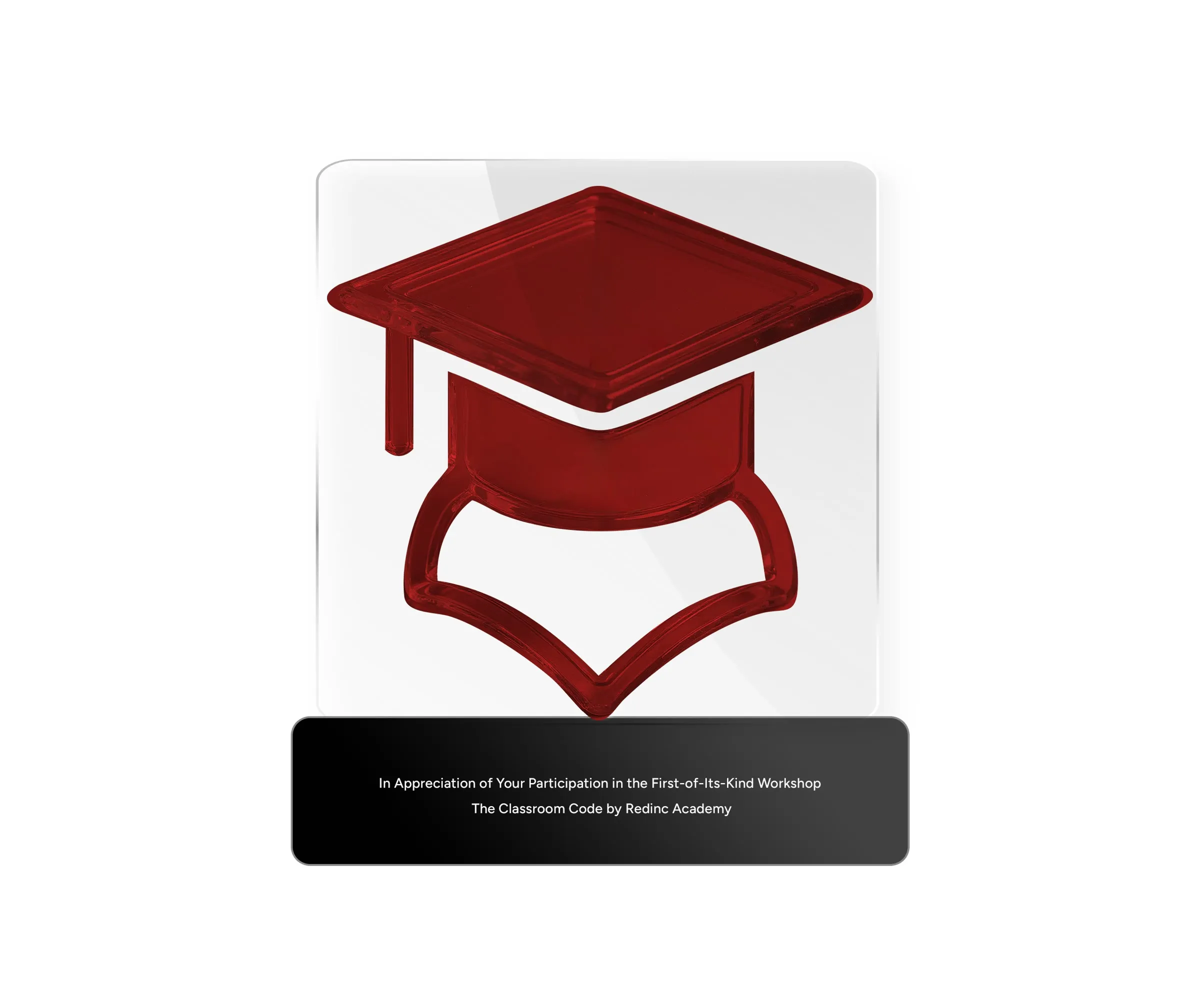 Clear acrylic award with the Redinc cap mark in deep red and a black base that reads In Appreciation of Your Participation in the First-of-Its-Kind Workshop, The Classroom Code by Redinc Academy